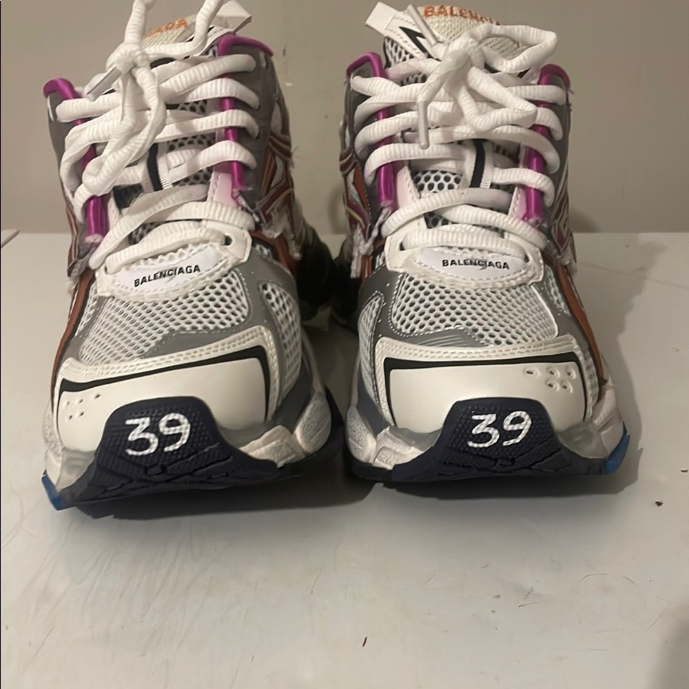Balenciaga White and Purple Sneakers

warned one time in great condition